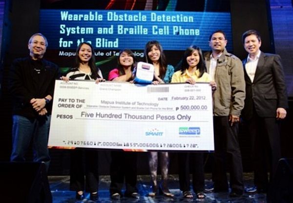 Students from Mapua receive their award for conceiving Braille Phone