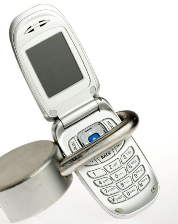 Cellular phone locked illustrating security, privacy and safety